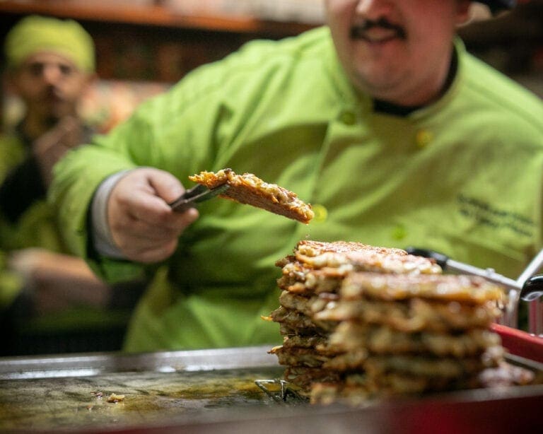 Christkindlmarket Vendor Serving Potato Pancakes