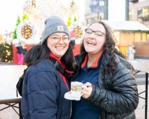 Two Friends having a good time at the Christkindlmarket Wrigleyville