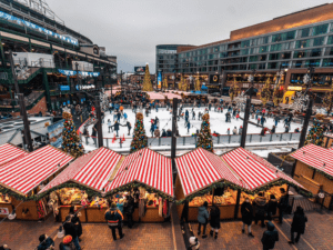 Visitors ice skating at the ice rink at the Christkindlmarket in Wrigleyville.