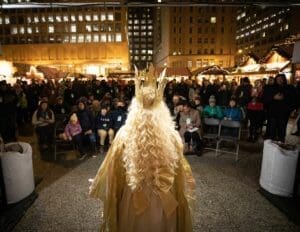 The Christkind greets visitors at the preview party for the Christkindlmarket Chicago