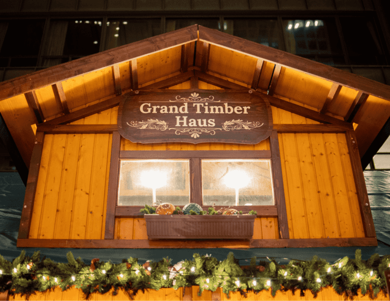 The wooden Alpine themed Grand Timber Haus at the Christkindlmarket Chicago