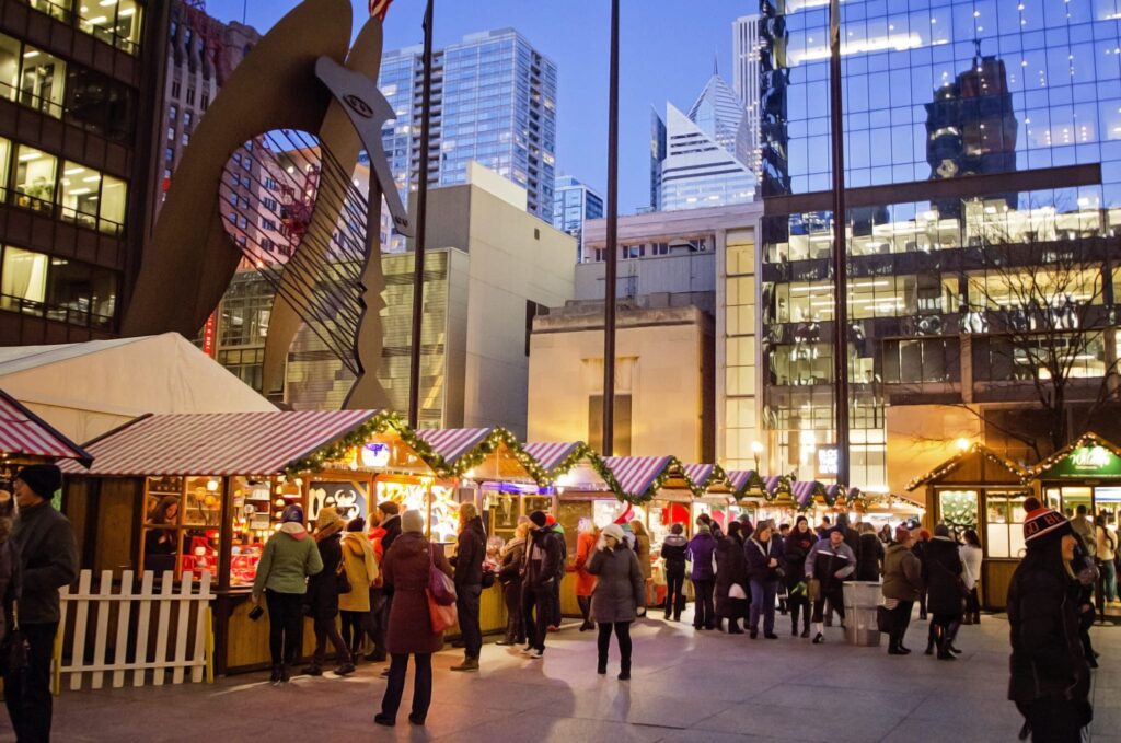 The Christkindlmarket Chicago at Daley Plaza at nighttime
