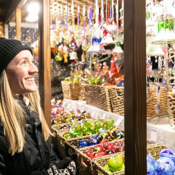 a girl shopping at christkindlmarket